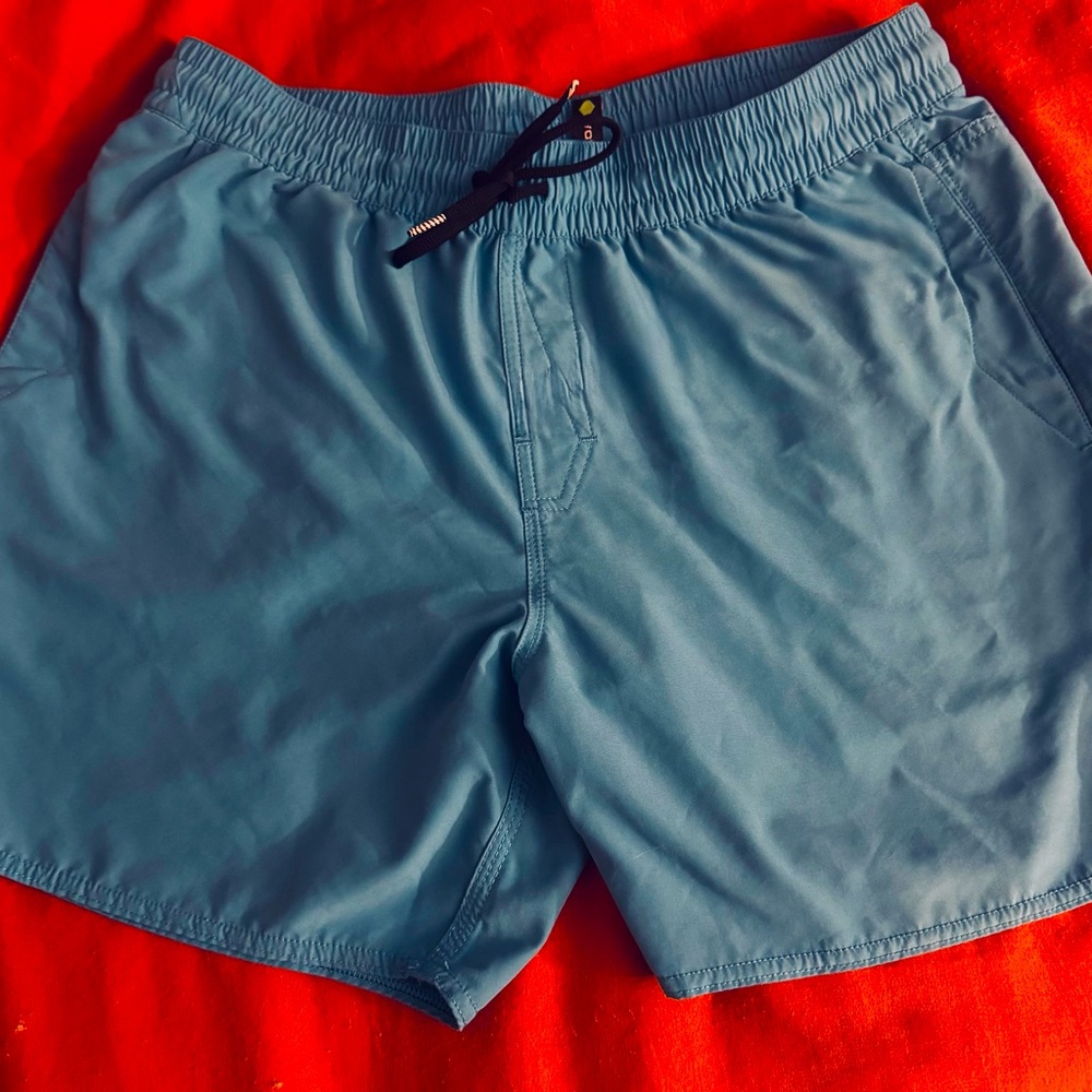 Ocean Blue Volcom Board shorts with elastic waste band.